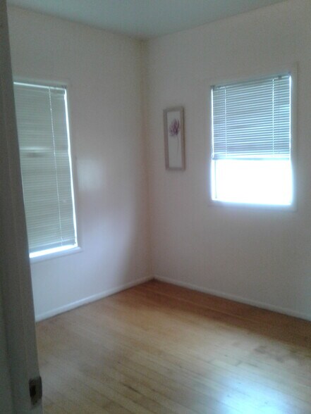 Master bedroom fits a queen bed. - 1509 West Hazel Street