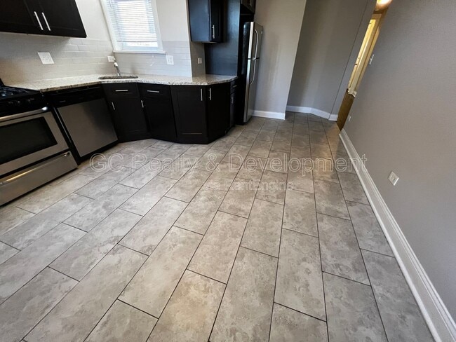 Building Photo - 6031 S Eberhart Ave