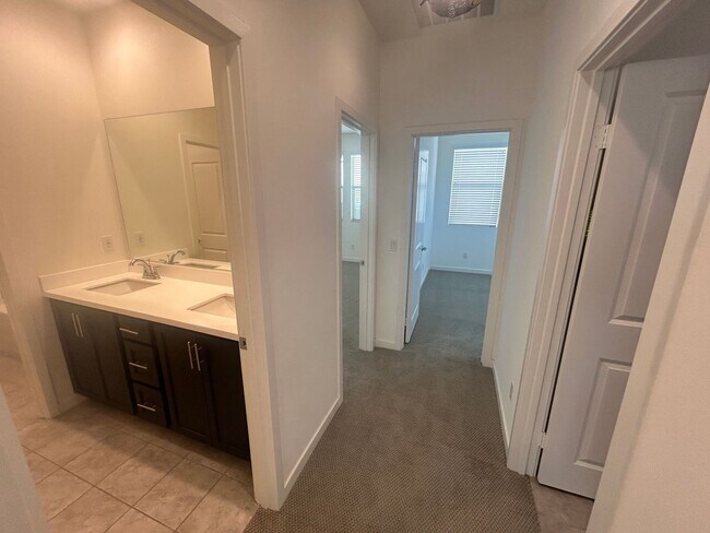 Building Photo - Modern 4 Bedroom Home with Downstairs Suite, Owned Solar & Resort-Style HOA Amenities