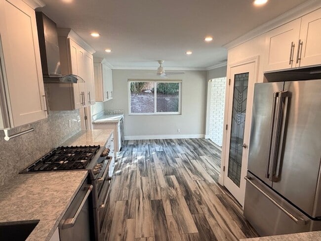 Building Photo - Remodeled 3 Bedroom Home with Bay Views + Stunning Backyard Patio