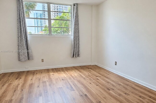 Building Photo - 19390 Collins Ave