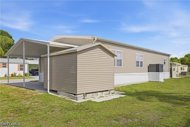 Building Photo - 24 Red Poinciana Dr