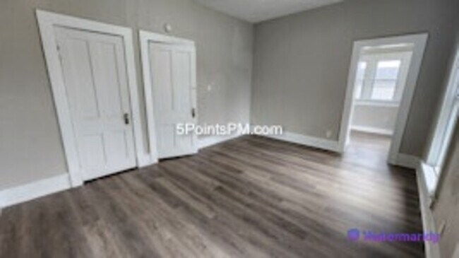 Building Photo - 9804 Miles Ave