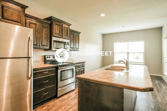 Building Photo - 4 Bedroom Pet-Friendly Home in Grain Valley, MO with Main Street Renewal