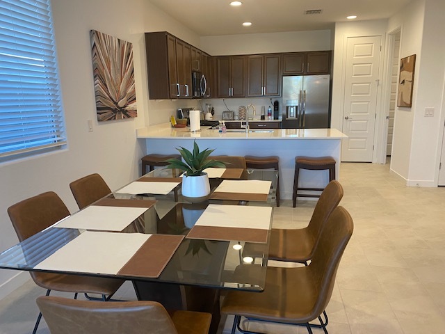 Dining Area and Kitchen - 8916 W Solano Dr