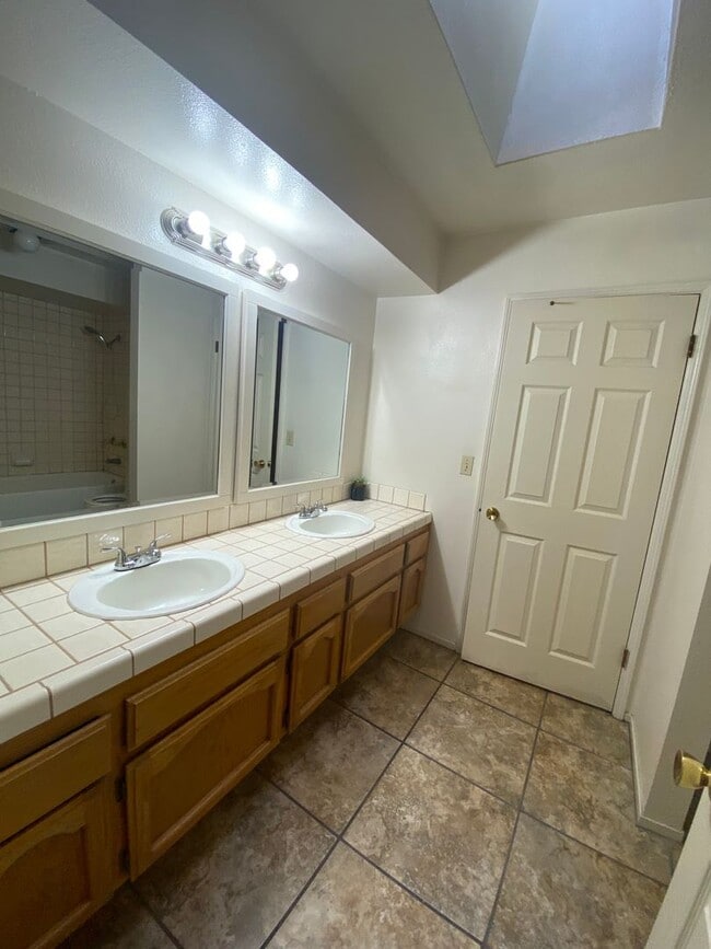 Building Photo - Get ready for Summer in this 3 BD 2 BA SW home with a Pool on a corner lot