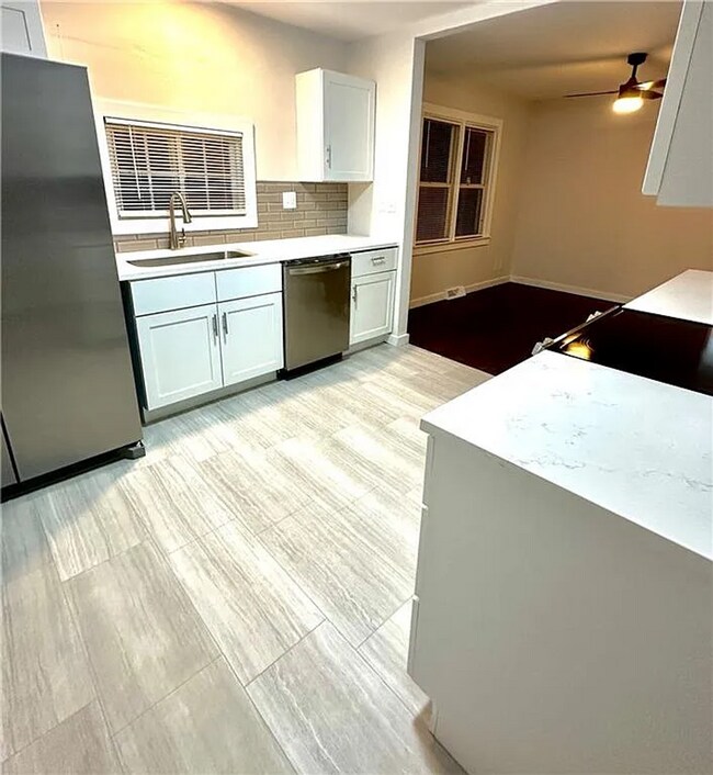 Building Photo - Welcome Home to Comfort, Space & Style!