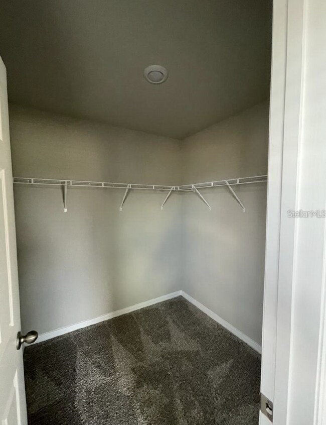 Building Photo - Beautiful corner unit townhouse features an abundance of natural light.