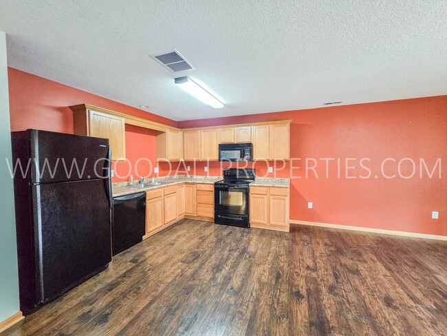 Building Photo - Bright & Spacious Waukee Townhome Near Dining, Shopping & Entertainment