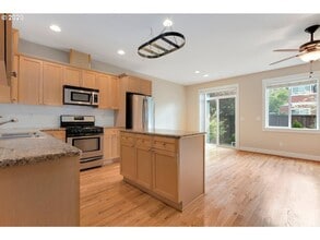 Building Photo - Bright Bull Mountain Townhome - Hardwoods, Granite, Private Patio, Garage, and more!