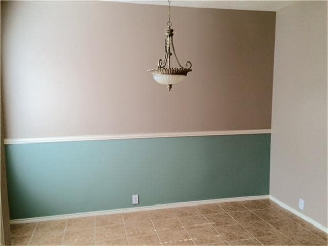 12x11 dining space ready for family meals and entertaining. - 23619 Twisting Falls Drive