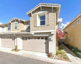 Building Photo - Exclusive, 3 bedroom townhome in sought-af...