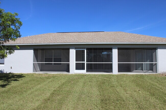 Building Photo - ** FIRST MONTHS RENT FREE** Quiet and Spacious Single Family Home in NW Cape Coral