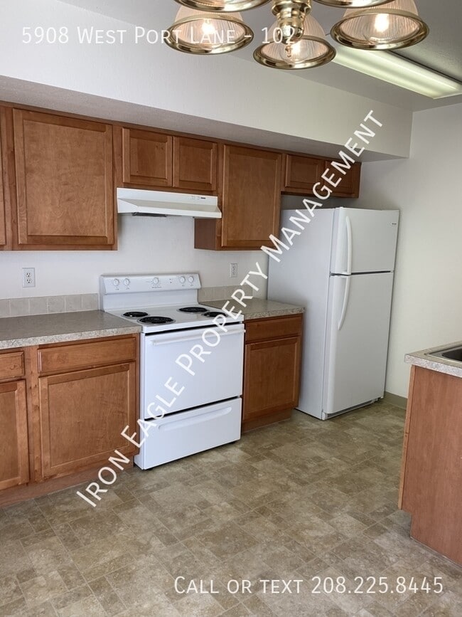 Building Photo - 5908 West Port Lane - 102-