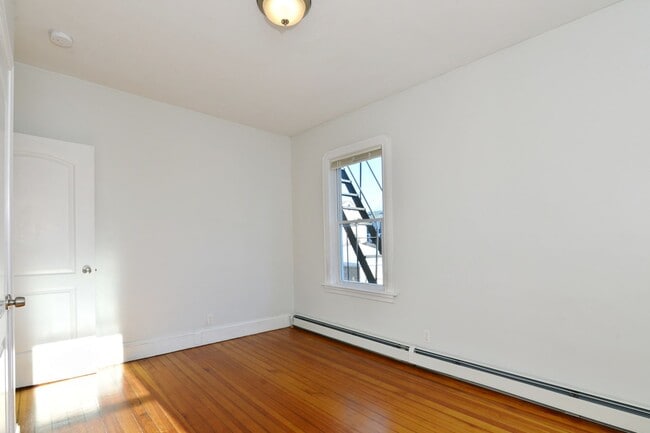 Building Photo - First Floor- 3 Bedroom with parking and ow...