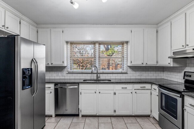 Building Photo - Elon - Large Brick Home, Hardwoods, Granite Counter-Tops, SS Appliances, Fire Place, Carport - Mu...