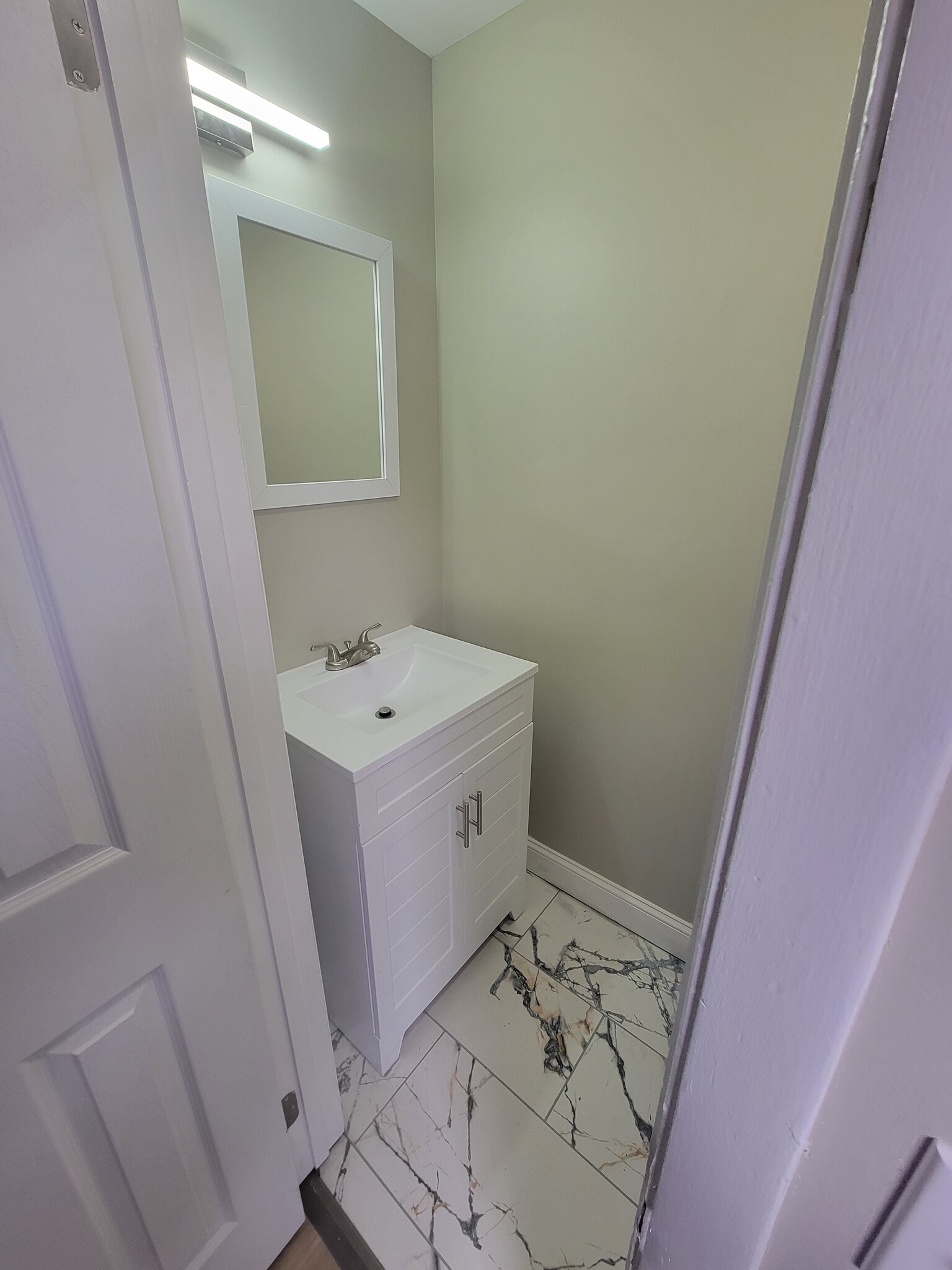 1/2 bath- 1st Floor - 257 Hague St