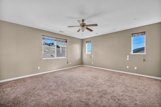 Building Photo - Sun-Filled, Spacious Living with a Three-Car Garage