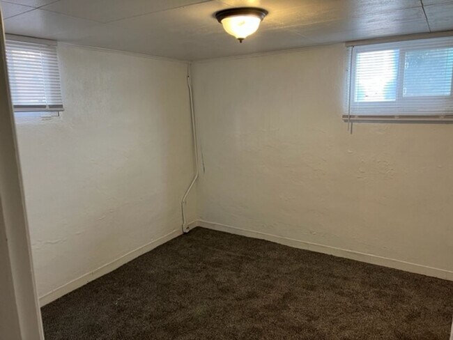 Building Photo - Updated home with 2 car carport and washer/dryer