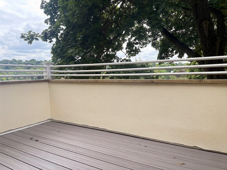 Completely new decking installed in street-facing that is connected to bedroom #1. - 307 Tappan St