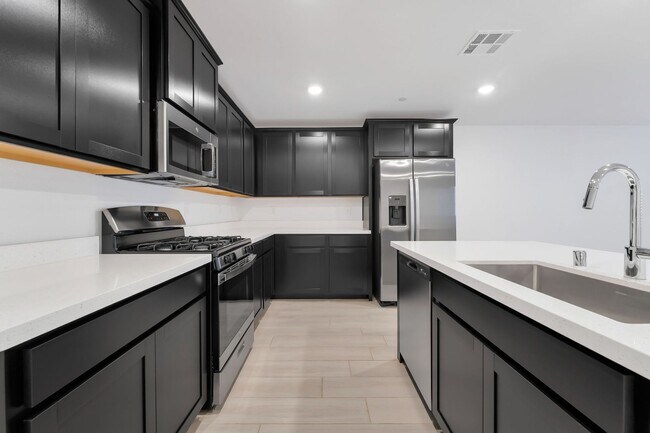 Building Photo - Modern Cadence Townhome with Sleek Finishes & Open-Concept Living!