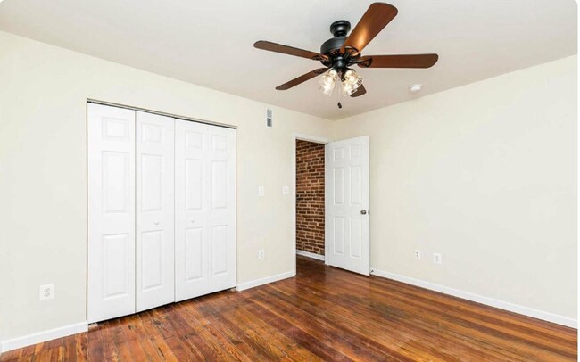 Building Photo - Charming 2bdrm 2.5 bath Patterson Park home with parking and rooftop deck