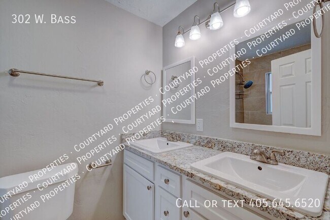 Building Photo - 302 W. Bass-