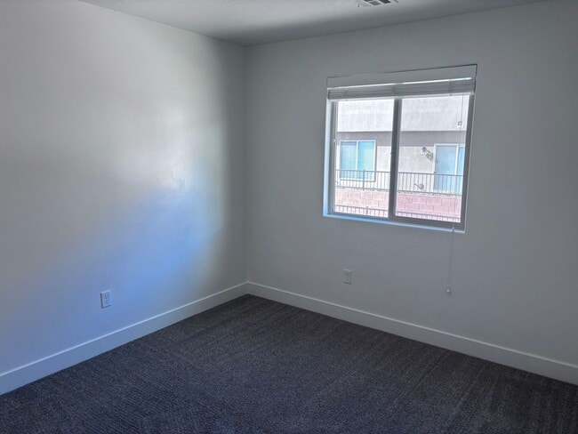 Building Photo - 4bd | 2.5 Bath | 2 Car Detached Desert Canyon Townhome Now Available