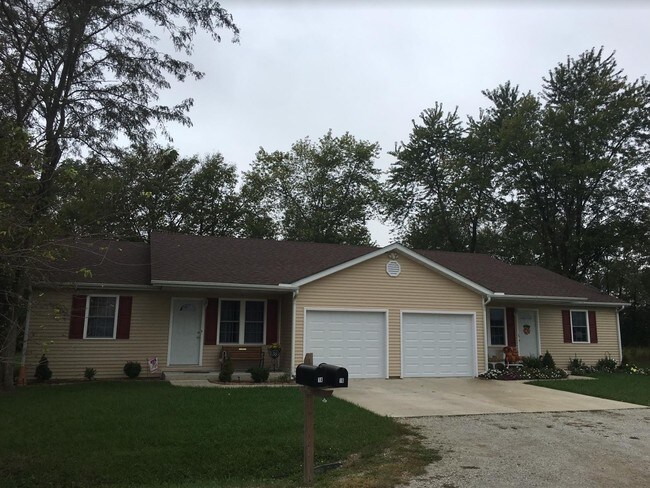 Building Photo - 1 Whispering Pines Ct