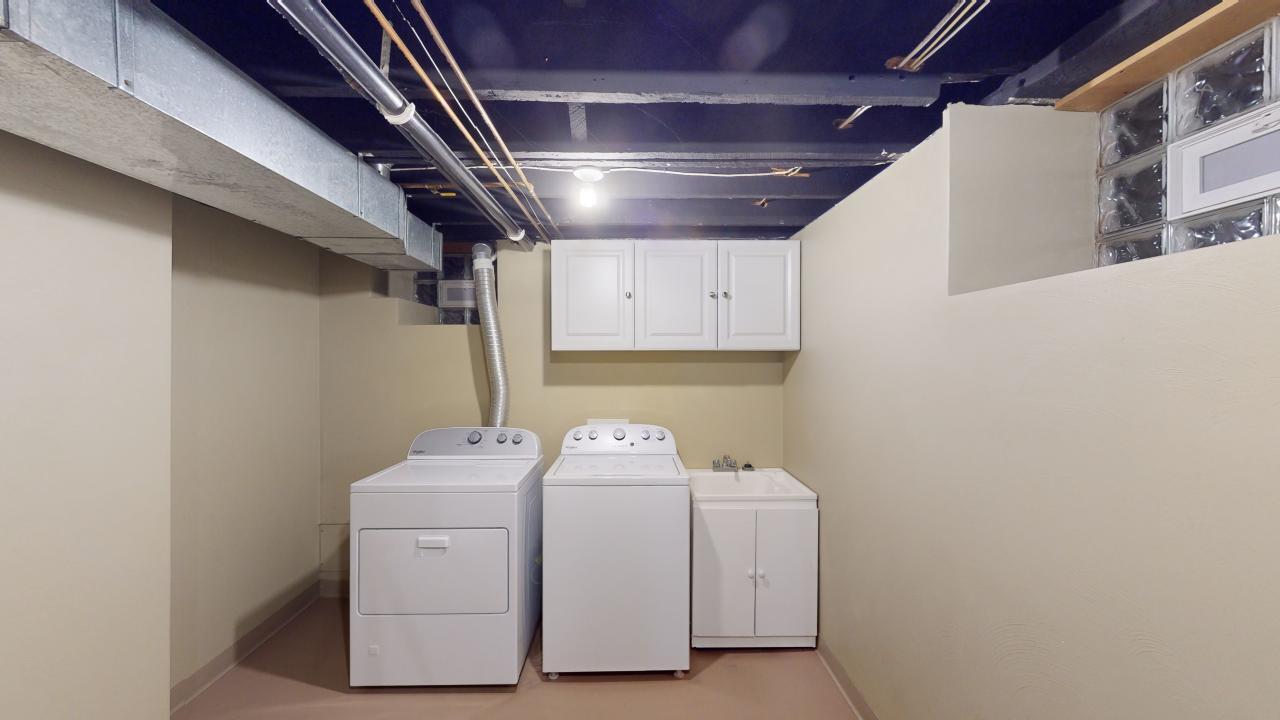 Laundry room with lots of room for storage. - 5827 Pierce St