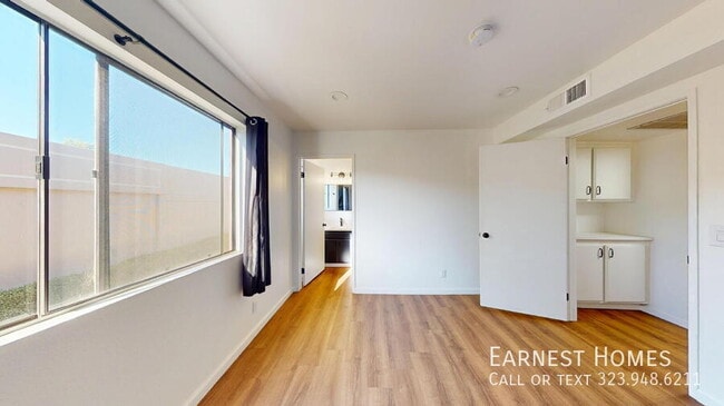 Building Photo - 10220 De Soto Ave