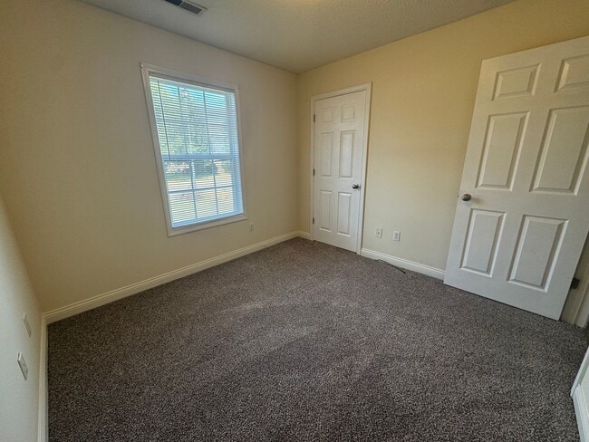Building Photo - Spacious three bedroom, two bathroom home