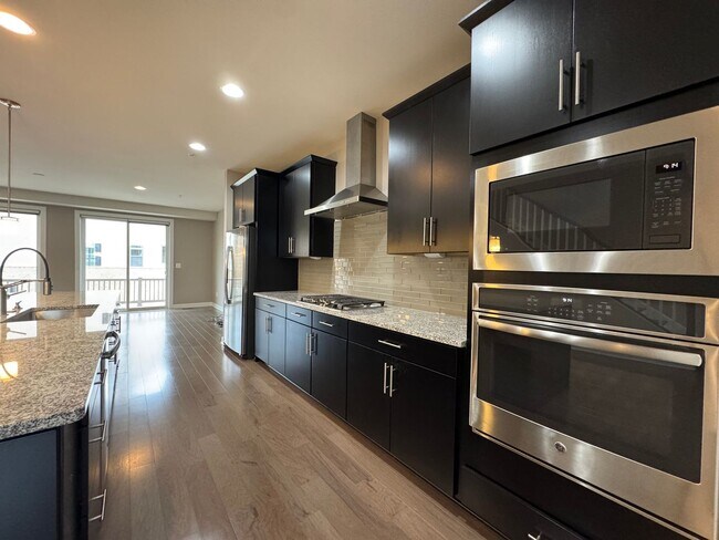 Building Photo - Stunning 4 Level 4 Bed 3/2 Bath Home With Balcony And Deck In Westmoore At Moorefield