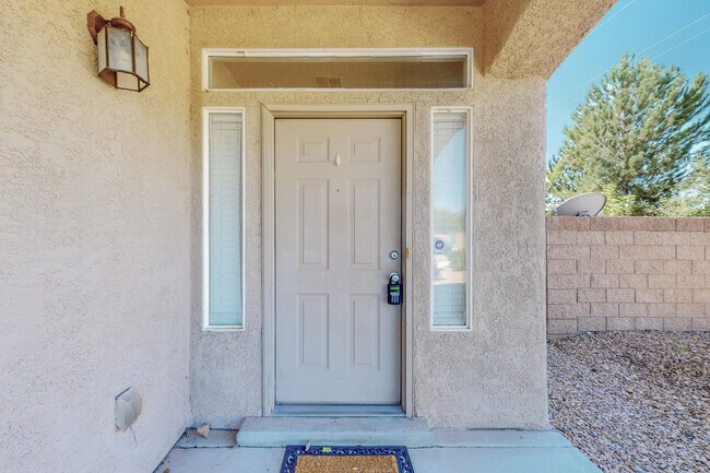 Building Photo - 6568 Los Pueblos Pl NW