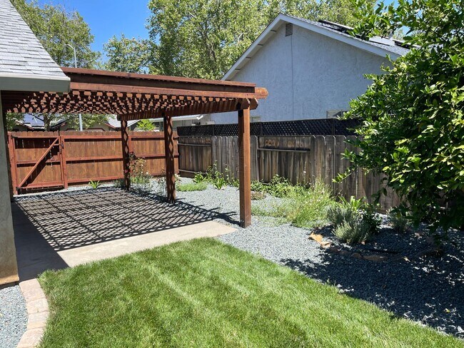 Building Photo - Central Chico, 3/2 fenced yard, 2 car garage, Gardener included, Solar, Fireplace, Craftsman Pergola