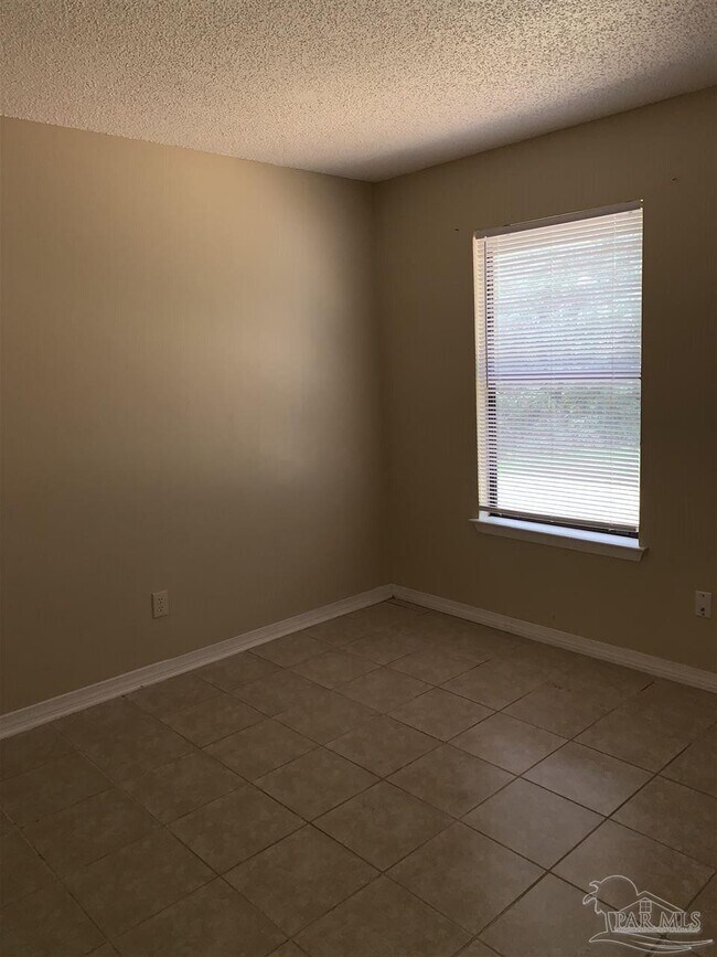 Building Photo - 6823 Tiki Ln