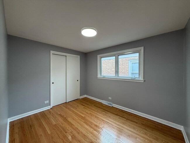 Building Photo - 7807 S Laramie Ave