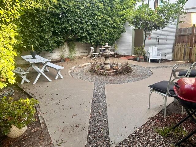 Private large backyard with lemon tree and outdoor furniture and grill - 1248 N Citrus Ave