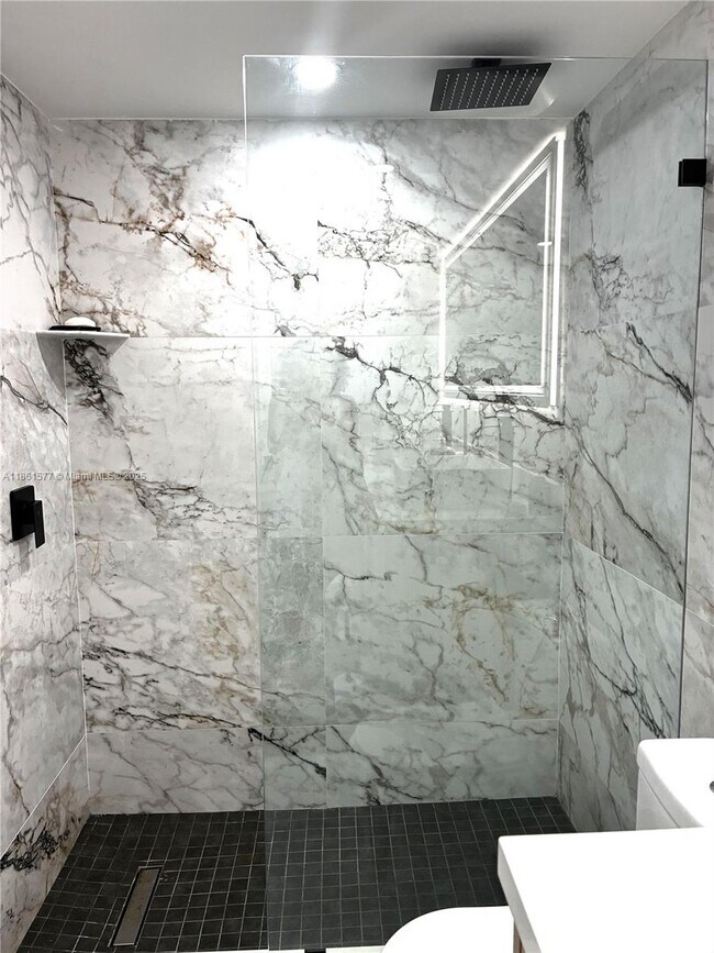 Building Photo - 6917 Collins Ave