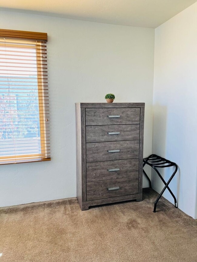 Building Photo - Furnished monthly rental home with all uti...