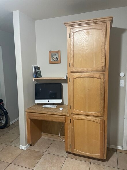 Kitchen pantry and desk area with bookshelf - 2607 Ringold Cir