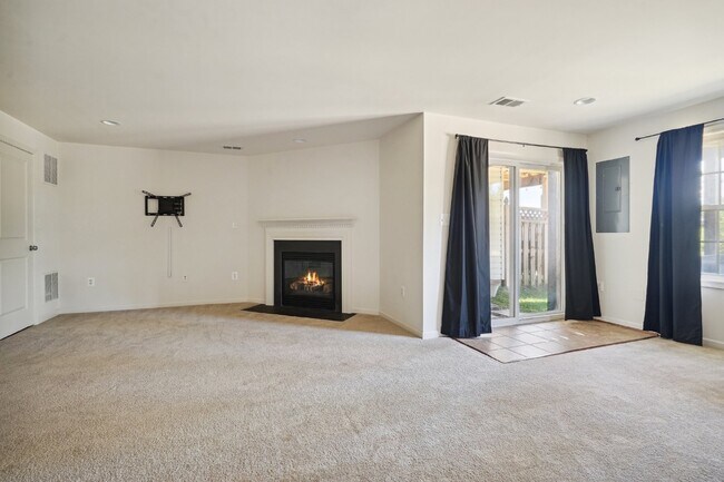 Building Photo - This beautiful townhome spans three finished levels and over 2800 square feet.