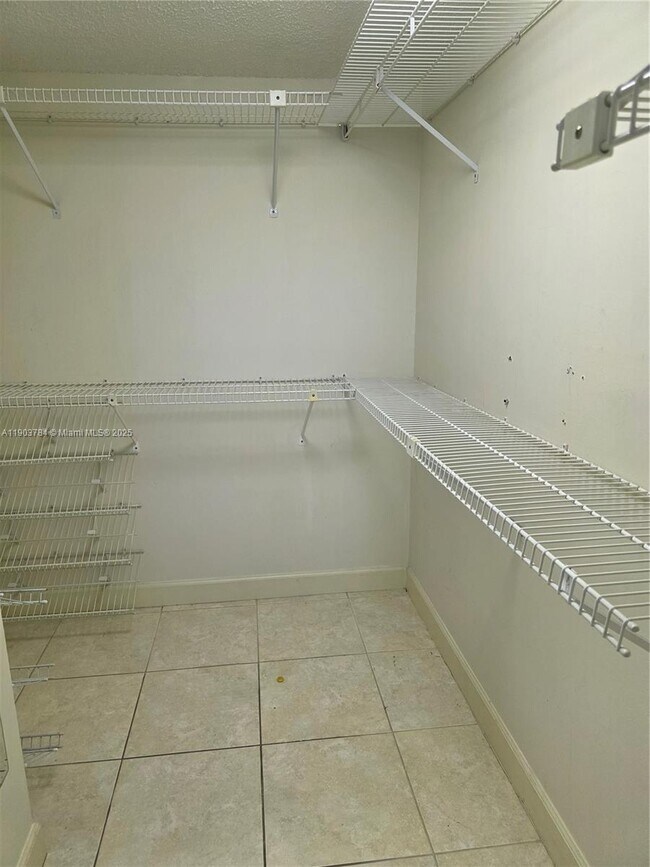 Building Photo - 9917 W Okeechobee Rd