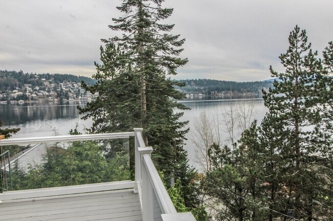 Building Photo - Spacious 4-Bedroom Home with Stunning Lake...