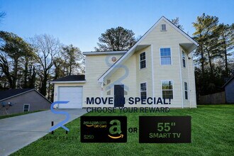 Building Photo - Move in before December 31st and choose your reward: a $250 Amazon Gift Card or a 55 Smart TV!