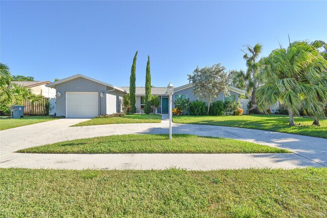 Building Photo - 6550 Country Wood Way