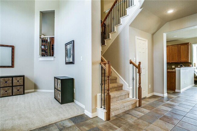 Building Photo - Immaculate home on a beautifully landscaped lot, tandem garage, plenty of storage!