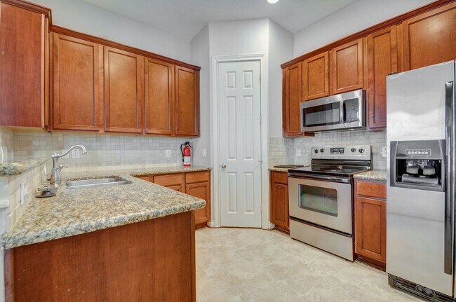 Building Photo - 3 Story home in private gated community!