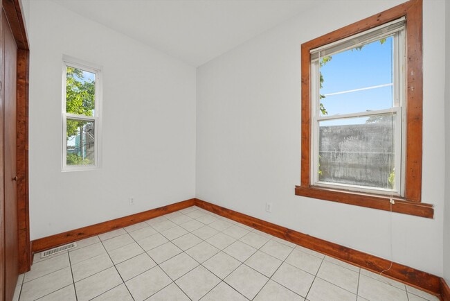Building Photo - 6540 S Vernon Ave