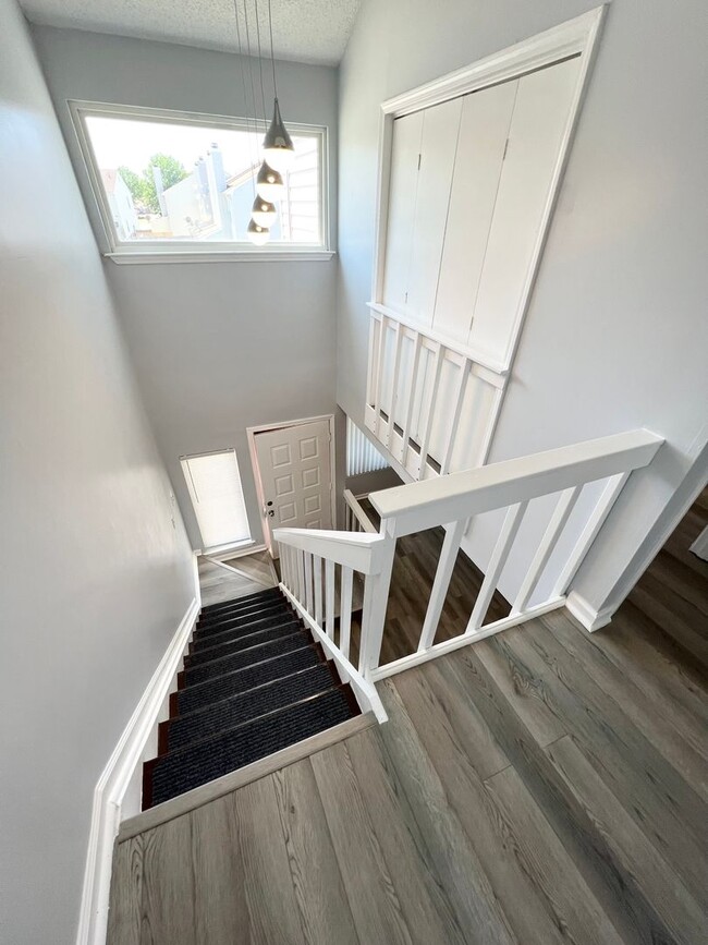 Building Photo - Stunning 3 Bedroom 2.5 Townhome Located in...